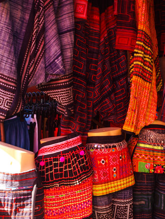 Colorful hill tribe fabric skirts in market in Chiang Mai, Thailandの写真素材