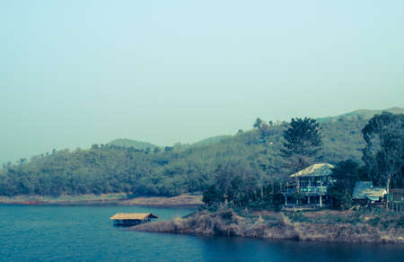 Floating bamboo hut in peaceful lake in Chiang rai, Thailand: Filtered image:cross processed vintage effect.の写真素材
