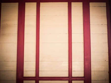 cream and red wooden panel in retro styleの写真素材