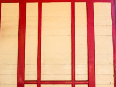 cream and red wooden panelの写真素材