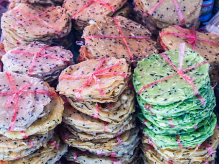 Pile of Thai traditional crispy rice cracker before bakedの写真素材