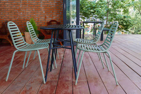 Outdoor table & chairs in bistro cafÃ© in daytime in nature for relaxation, travel, season, time, holiday, agritourism, agrotourism conceptの写真素材