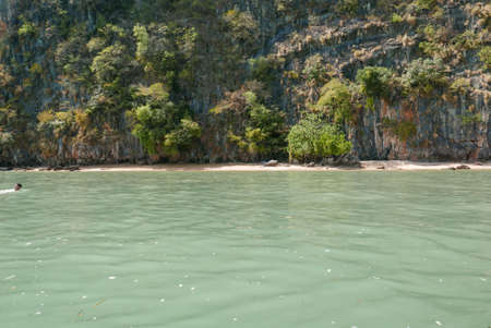 Sea forest on mountain in summer in Thailand along coastal area in Phangnga Bay national park, Thailand in summer for environment, relaxation, travel, journey, season and climate change conceptの写真素材