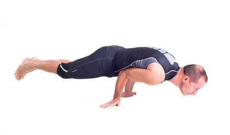 Practicing Yoga exercises   Challenge Pose - Koundiyanasanaの写真素材