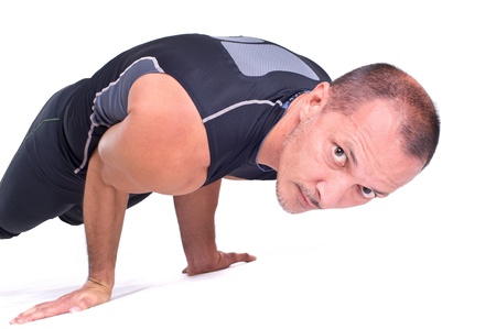Practicing Yoga exercises   Challenge Pose - Koundiyanasanaの写真素材