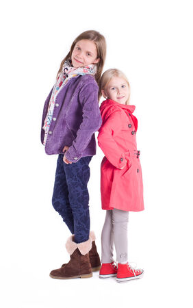 Two little girl posing together の写真素材