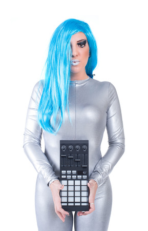Cyber woman posing with audio equipment  Isolated on a white background  Studio shotの写真素材