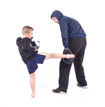 kickboxing kids with instructor  Isolated on a white background  Studio shotの写真素材