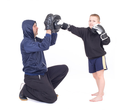 kickboxing kids with instructor  Isolated on a white background  Studio shotの写真素材