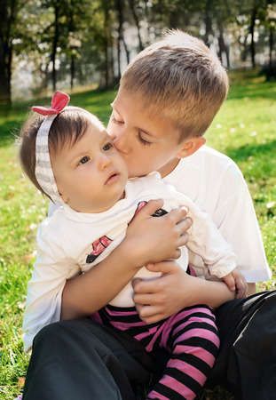 Family hug  Brother And Sister Together For Everの写真素材