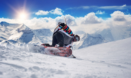 Extreme snowboarding man. Winter Scenic in the French Alps Les 2 Alpes Extreme snowboarding man. Winter Scenic in the French Alps Les 2 Alpes