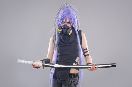 Female fantasy warrior. Female warrior with sword and gas mask isolated on the gray background