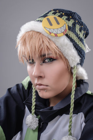 Urban girl with green lens posing in studio