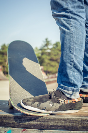 Skateboarding legs at skate parkの写真素材