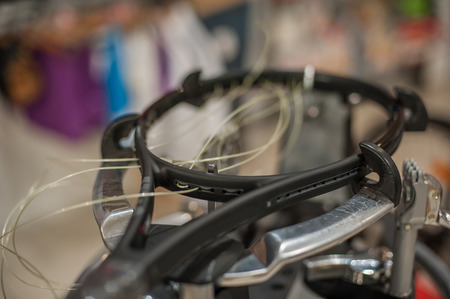 Racket stringing. Detail of tennis racket in the stringing machineの写真素材