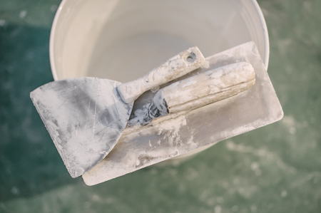 Set of assorted plaster trowel tools and spatula. Construction toolsの写真素材