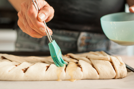 Professional cook making chocolate pie. Close upの写真素材