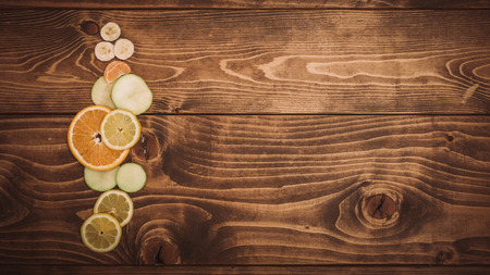Fresh organic fruits on wooden table. Close upの写真素材