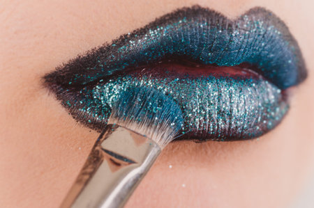 Close up of beautiful woman face portrait with tinsel makeup. Macro shooting photography