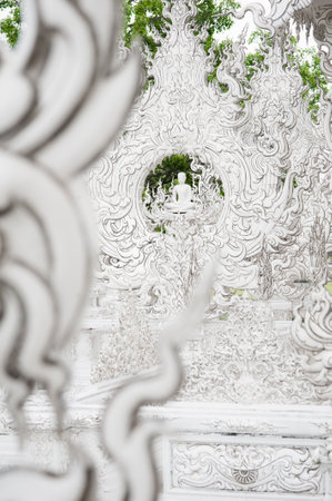 WAT RONG KHUN - WHITE TEMPLE, CHIANG RAI THAILAND - CIRCA MAY 2018. Buddha figure detail at contemporary Buddhist religious temple. Buddhism architectureのeditorial素材