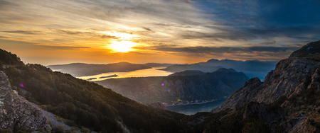 Panorama of Mediterranean Sea surrounded by mountains at colorful sunset. Montenegroの写真素材