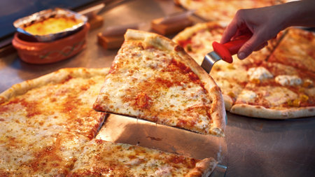 Slice of margarita pizza on scapula. Tasty fast food italian traditional