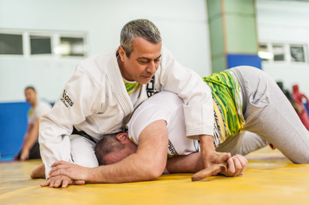 PLOVDIV, BULGARIA - 15. DECEMBER 2018. Knife attack self defense fighting techniques training. Kapap...