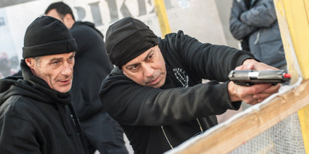 Pozarevac, Serbia - December 21-24, 2018: Kapap Instructor Avi Nardia teaches his students on the shooting range GROM, how to safely use the gun on KAPAP BASIC FIREARMS SAFETY AND GUN USE SEMINARのeditorial素材