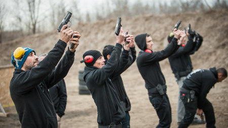 Pozarevac, Serbia - December 21-24, 2018: Large group of kapap students practice different skills with gun in the shooting range GROM on KAPAP BASIC FIREARMS SAFETY AND GUN USE SEMINARのeditorial素材