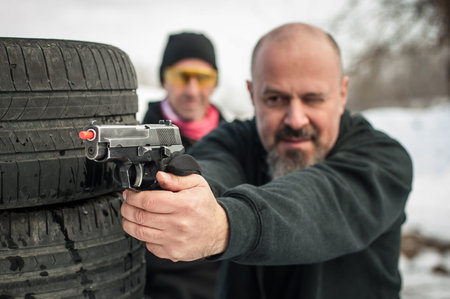 Pozarevac, Serbia - December 21-24, 2018: Kapap students practice different skills with gun in the...