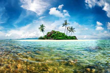 Exotic paradise island with palms and turquoise crystal clear sea. Amazing fantasy scenery islandの写真素材