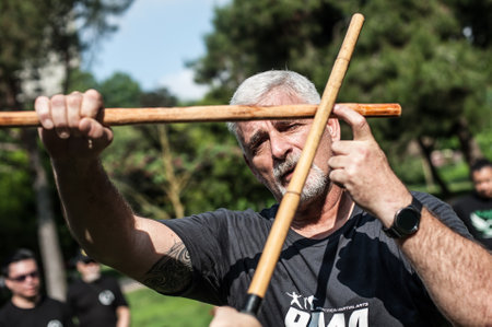 ISTANBUL, TURKEY - Maj 30 - Jun 02. 2019. Kapap instructor Fabian Garcia from Argentina, demonstrates escrima stick fighting to large group of students on GENERAL MEETING OF KAPAP INSTRUCTORSのeditorial素材