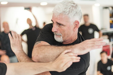 ISTANBUL, TURKEY - Maj 30 - Jun 02. 2019. Kapap instructor Fabian Garcia from Argentina, demonstrates face to face fighting techniques to group of students on GENERAL MEETING OF KAPAP INSTRUCTORSのeditorial素材