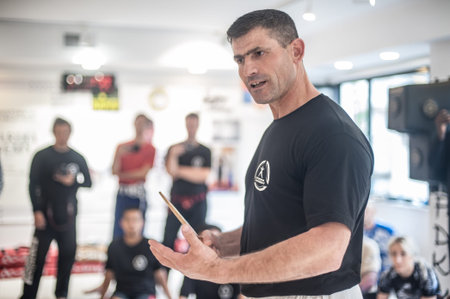 ISTANBUL, TURKEY - Maj 30 - Jun 02. 2019. Kapap instructor Altin Qoku, demonstrates disarm defense...