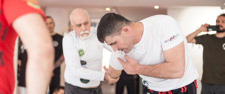 ISTANBUL, TURKEY - Maj 30 - Jun 02. 2019. Kapap instructor Altin Qoku, demonstrates street fighting techniques to group of students on GENERAL MEETING OF KAPAP INSTRUCTORSのeditorial素材