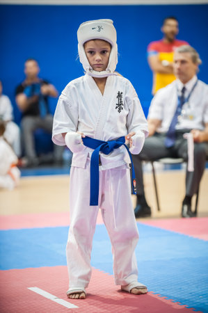 BELGRADE, SERBIA - 30. SEPTEMBER 2017. Little kids and children in sport kimono on Kyokushin Karate Belgrade Trophy Tournament competition at Sumice Sport Center. KYOKUSHINKAI FEDERATION OF SERBIAのeditorial素材