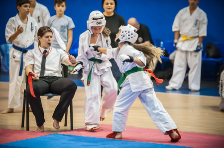 BELGRADE, SERBIA - 30. SEPTEMBER 2017. Little kids and children in sport kimono on Kyokushin Karate Belgrade Trophy Tournament competition at Sumice Sport Center. KYOKUSHINKAI FEDERATION OF SERBIAのeditorial素材