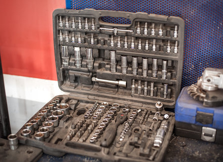 Mechanic tool set in auto vulcanizing and vehicle service workshop. Close up