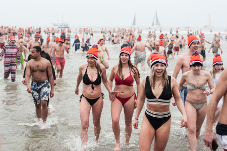 SCHEVENINGEN, NETHERLANDS â 01. January 2020. Scheveningen annual new yearâs dive and swim. Typical Dutch traditionのeditorial素材