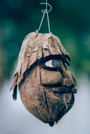 BALI, INDONESIA - 02. APRIL 2018. Coconut craft. Works of art made of coconut shells hanging in a...