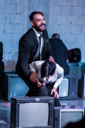 Theater actor artists on stage perform play for audience. Public performance. Theatre scene