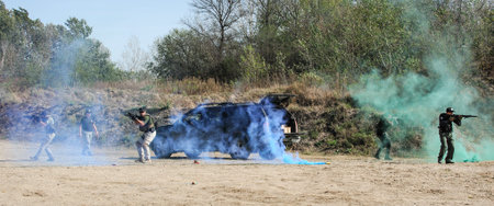 Anti-Terrorist unit exercise. Securing vehicles and rescuing hostages. Shooting and Weapons. Outdoor...