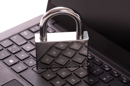 Cyber crime. Internet cyber security concept with a padlock on laptop computer. Ransomware, Malware,...