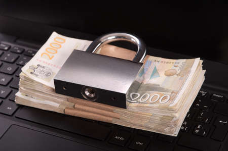 Cyber crime. Internet cyber security concept with a padlock on laptop computer. Ransomware, Malware, Encrypt and Hacking. Data security conceptの写真素材