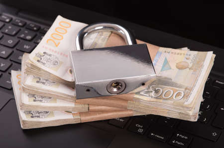 Cyber crime. Internet cyber security concept with a padlock on laptop computer. Ransomware, Malware, Encrypt and Hacking. Data security conceptの写真素材