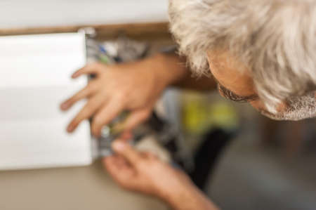 Close up of electrician engineer works with electric cable wires. Installation inspect. Electrical equipmentの写真素材