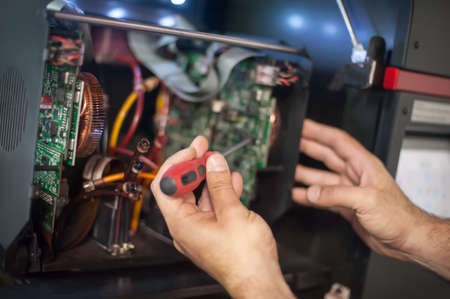 Close up of electrician engineer works with electric cable wires. Installation inspect. Electrical equipmentの写真素材