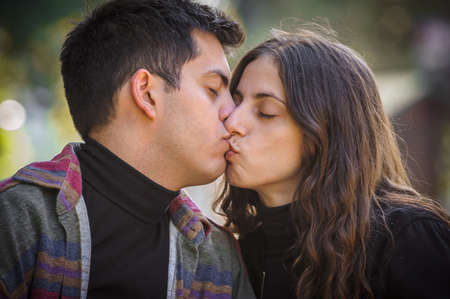 Close-up detail view of sexy French deep kiss. Sensual romantic couple in love hugging and kissing. Girl and boyfriend dating. Relationship and romance conceptの写真素材