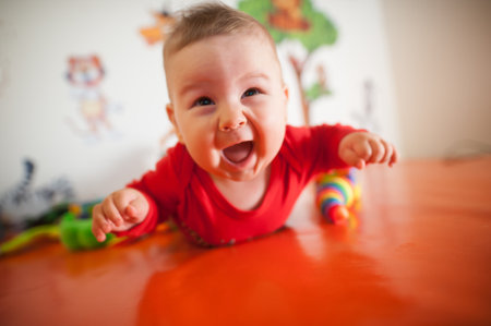 Portrait view of happy cute smiling baby boy. Joy and happiness concept. Love and family emotionの写真素材