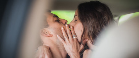 Passionate scene of young sexy couple kissing and having sex in ...